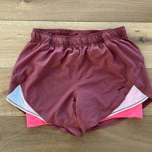 Brooks running shorts. Lightly worn. Purple/pink